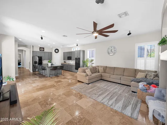 a bedroom with a bed and a fireplace