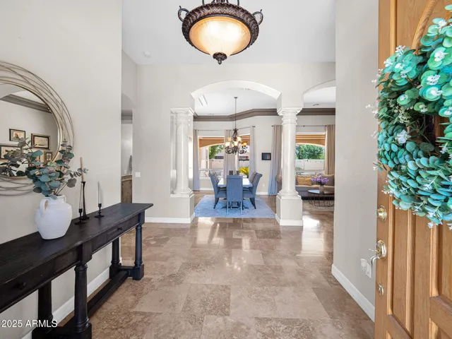 a view of a dining room with furniture window and outside view