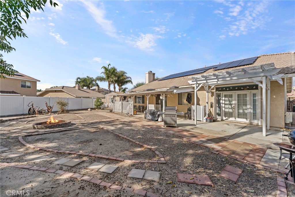 3155 Shipley Place Hemet, CA 92545 - Photo 21 of 26 a front view of a house with a yard