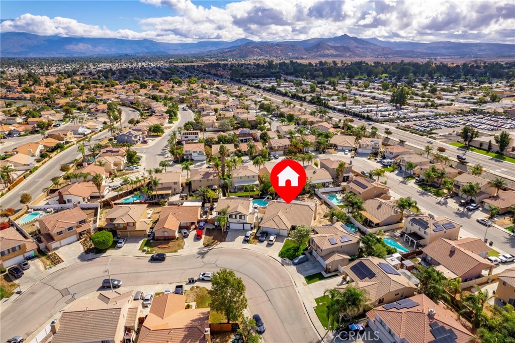 3155 Shipley Place Hemet, CA 92545 - Photo 25 of 26 an aerial view of a houses with a swimming pool