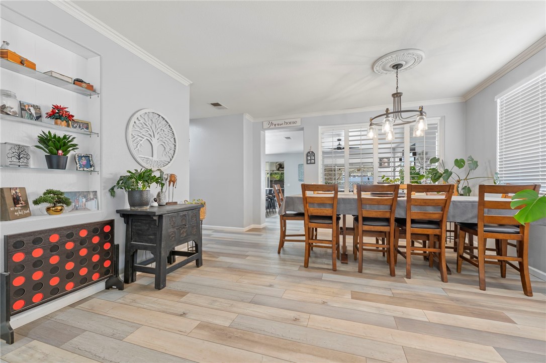 3155 Shipley Place Hemet, CA 92545 - Photo 5 of 26 a view of a dining room with furniture window and entryway