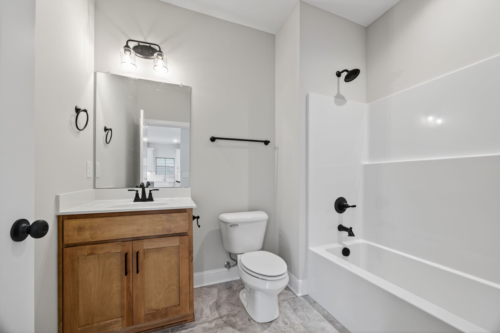 2140 Rylee Way, Unit 45 Greenbrier, TN 37073 - Photo 15 of 42 a bathroom with a sink a toilet and shower