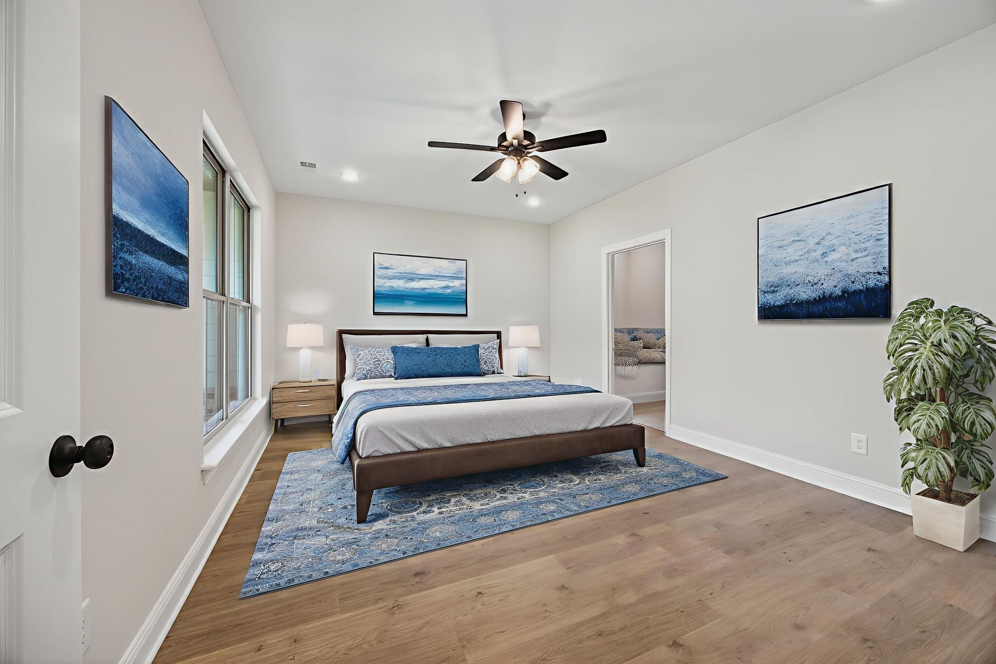 2140 Rylee Way, Unit 45 Greenbrier, TN 37073 - Photo 29 of 42 a spacious bedroom with a bed and a chandelier