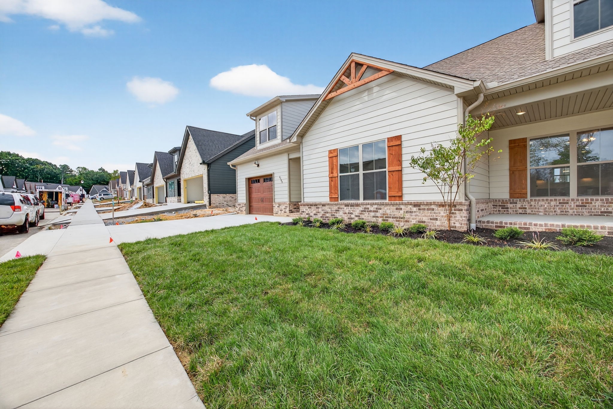 2140 Rylee Way, Unit 45 Greenbrier, TN 37073 - Photo 4 of 42 a front view of house with yard and green space