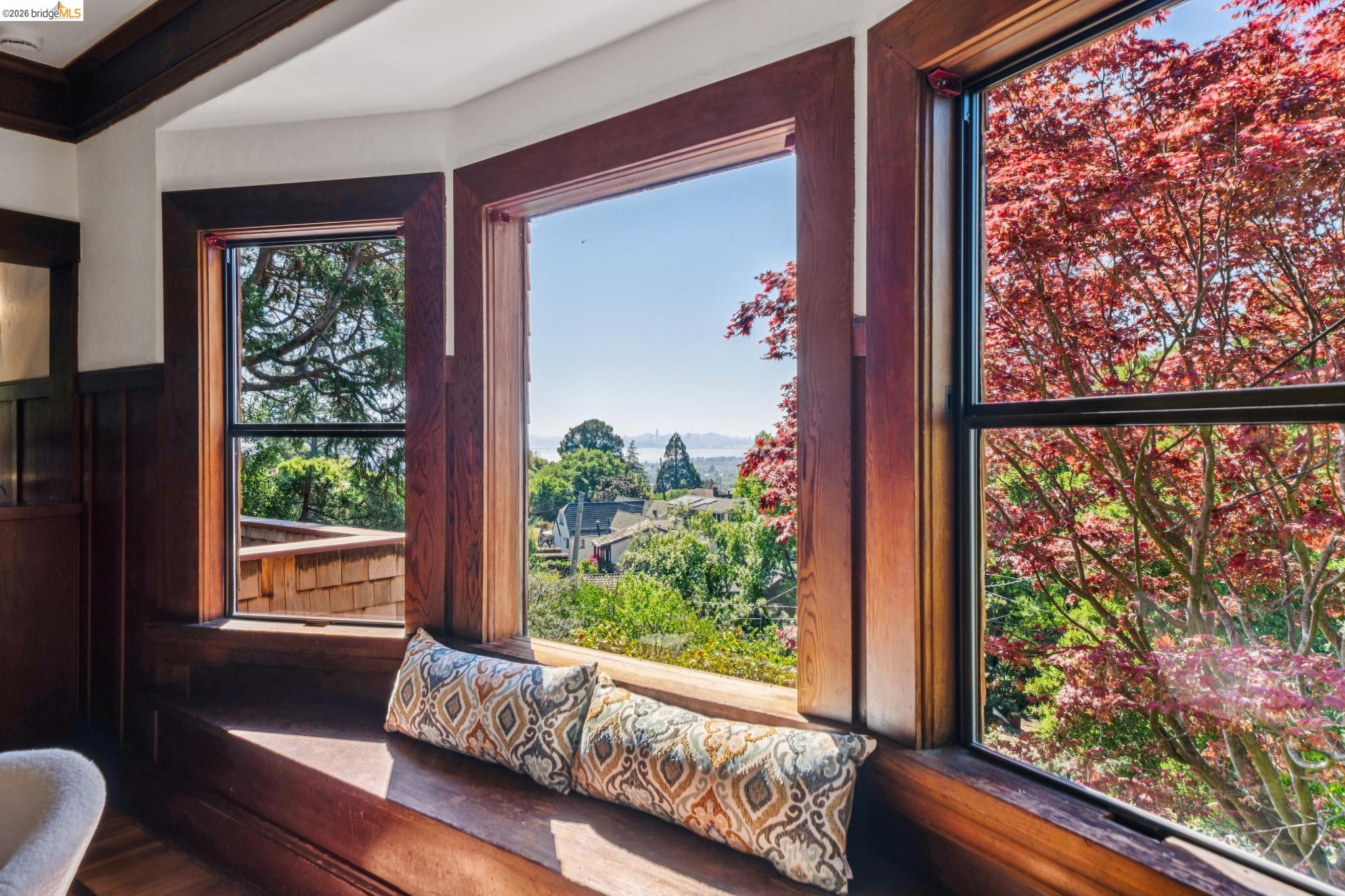 813 San Diego Road Berkeley, CA 94707 - Photo 16 of 60 a living room with couch and a window