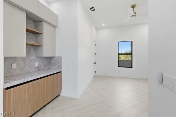 an empty room with windows