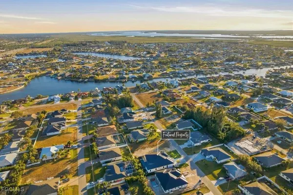 an aerial view of residential building with parking space