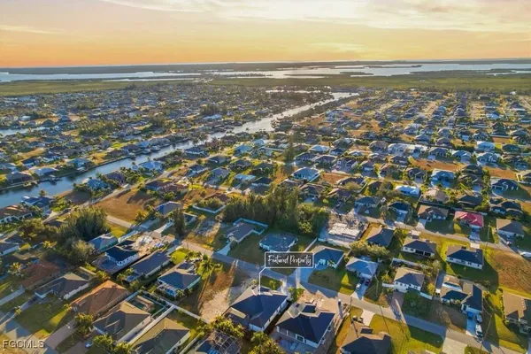 an aerial view of residential building with parking space