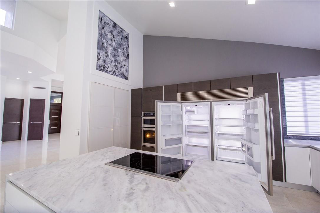 2725 Hackney Road Weston, FL 33331 - Photo 23 of 57 a large bedroom with a bed and a large window