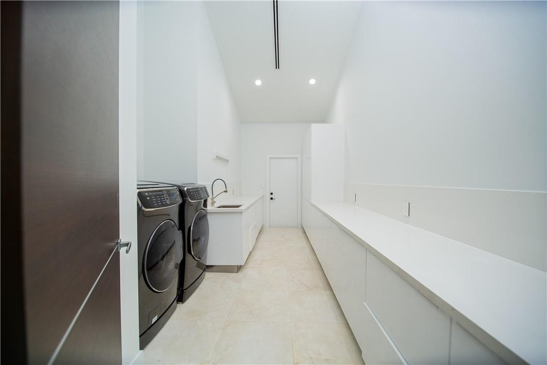 2725 Hackney Road Weston, FL 33331 - Photo 29 of 57 a bathroom with a sink and a toilet