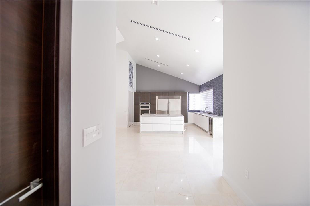 2725 Hackney Road Weston, FL 33331 - Photo 30 of 57 a view of a hallway with a living room