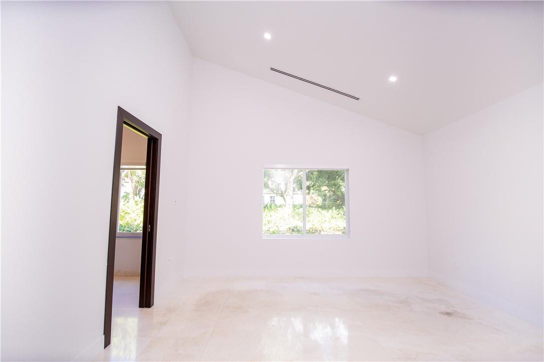 2725 Hackney Road Weston, FL 33331 - Photo 32 of 57 an entryway in a hall with a window