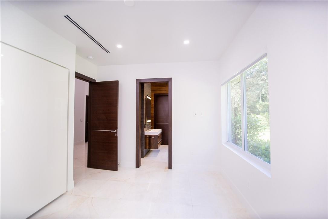 2725 Hackney Road Weston, FL 33331 - Photo 36 of 57 a view of empty room with furniture and large window