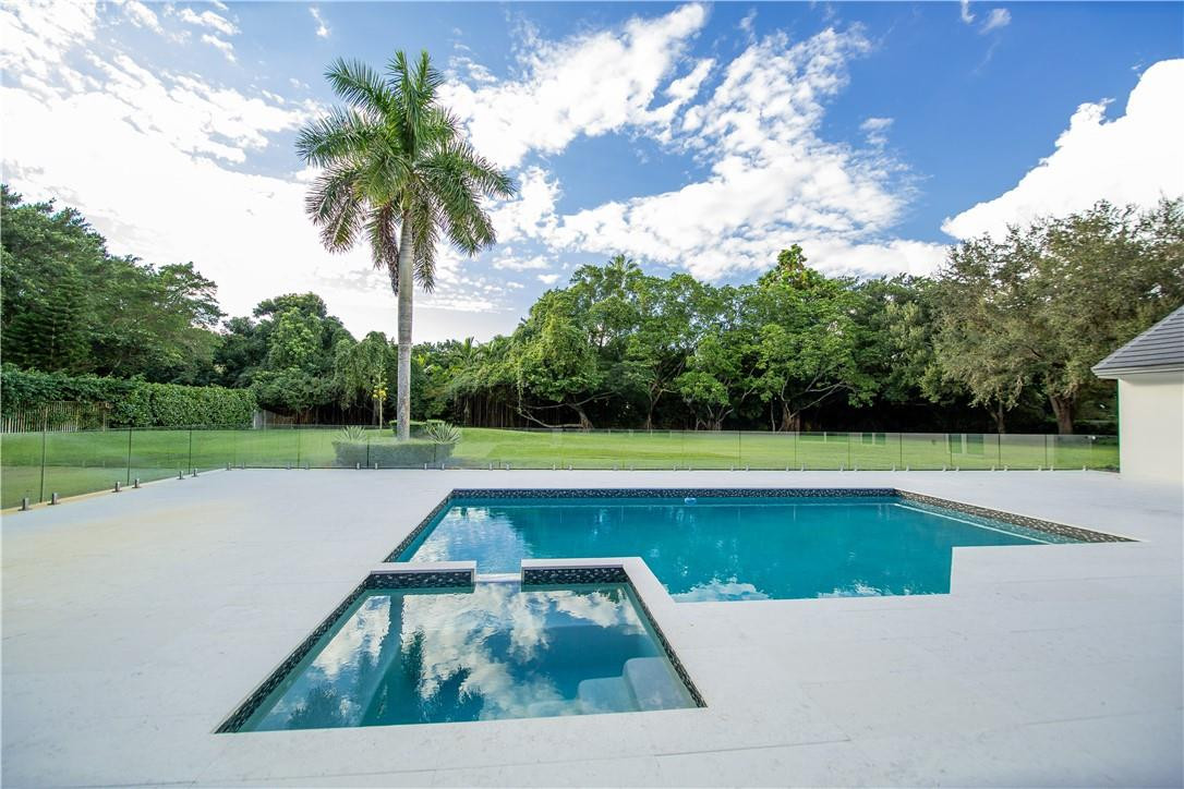 2725 Hackney Road Weston, FL 33331 - Photo 44 of 57 a view of swimming pool with a yard