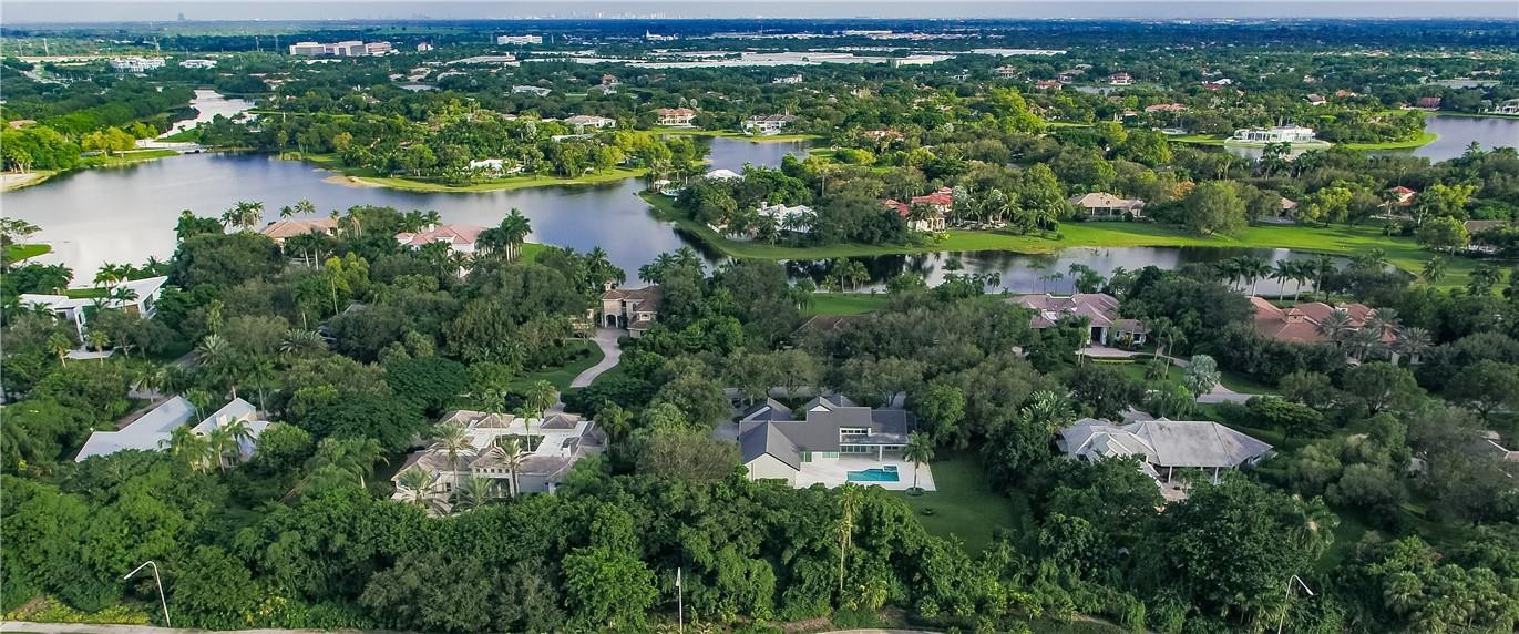 2725 Hackney Road Weston, FL 33331 - Photo 55 of 57 an aerial view of a houses with outdoor space and lake view