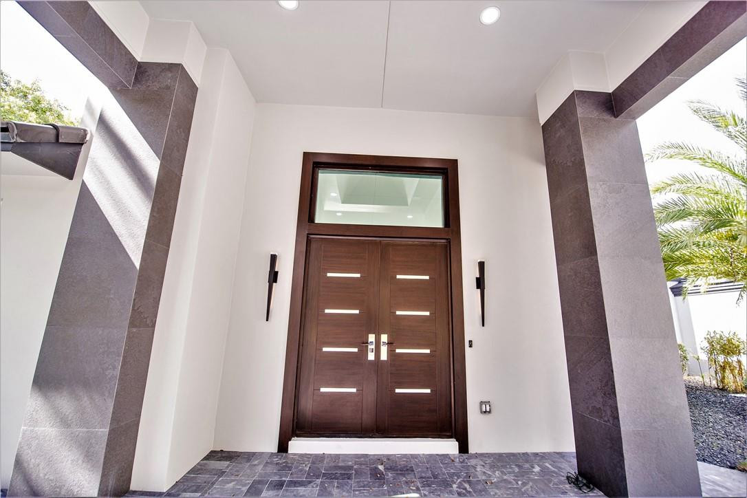 2725 Hackney Road Weston, FL 33331 - Photo 7 of 57 a view of a hallway with windows