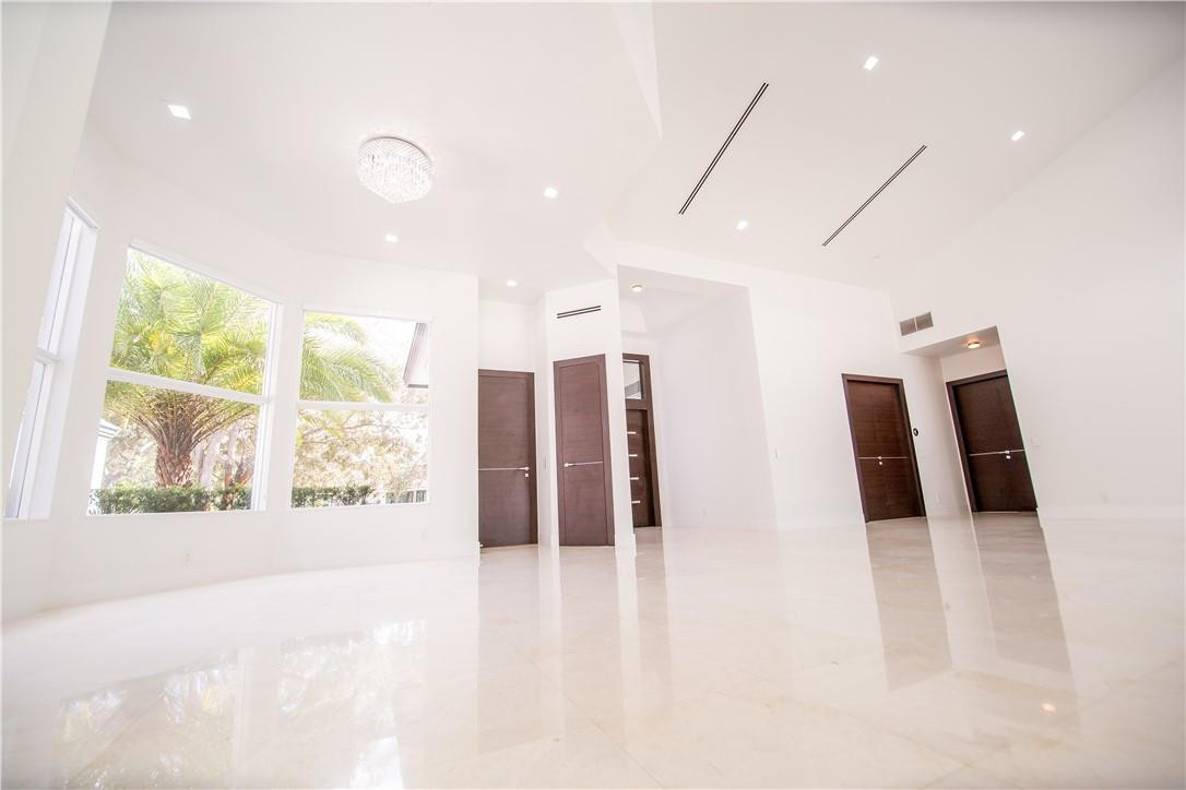 2725 Hackney Road Weston, FL 33331 - Photo 10 of 57 a view of a big room with windows