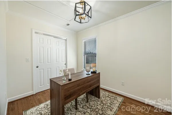 a room with a table and chairs