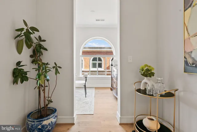 a view of a livingroom with furniture and a wooden floor