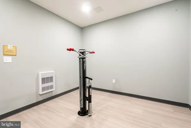 a kitchen with a sink appliances and cabinets
