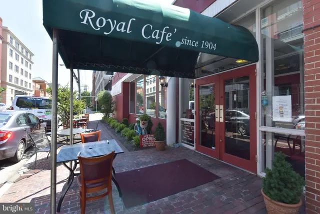 a sign on a pole on a street