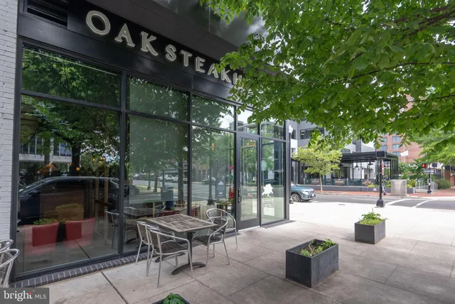 a view of a building with sitting area