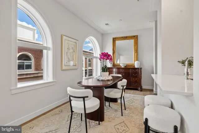 a view of a livingroom with furniture and window