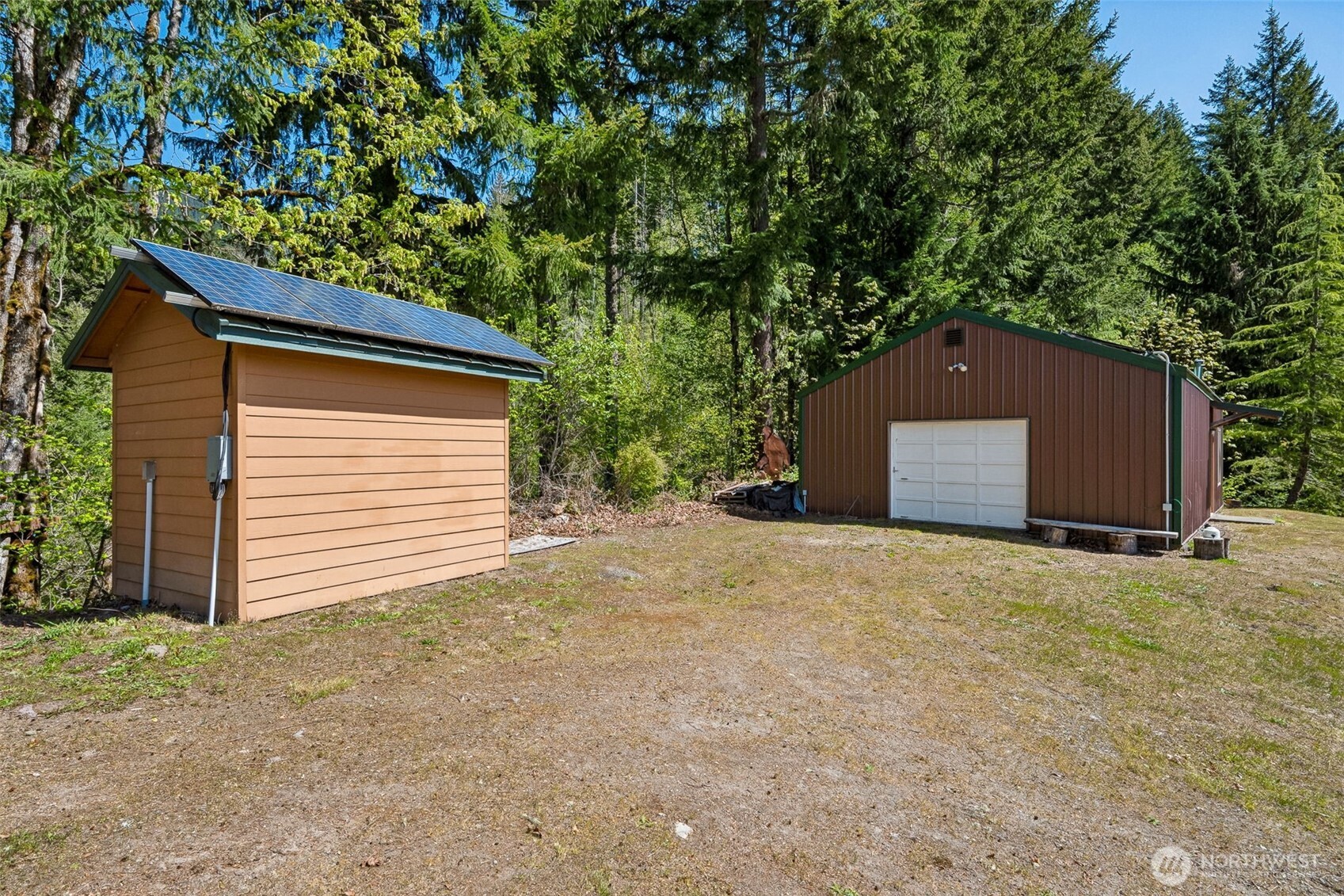 0 Boyd Road Randle, WA 98377 - Photo 27 of 39 a backyard of a house with yard and garage