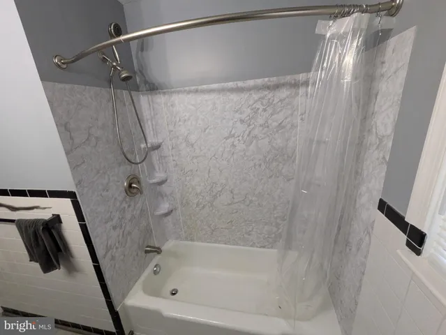 a bathroom with a bathtub