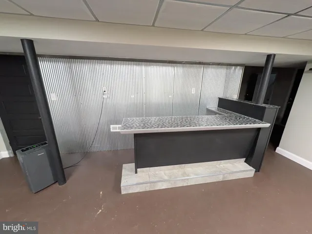 a view of washer and dryer with wooden floor