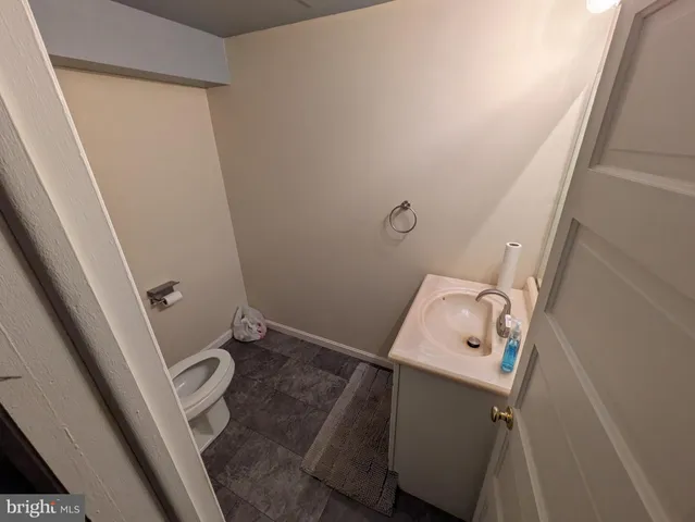 a bathroom with a sink and toilet