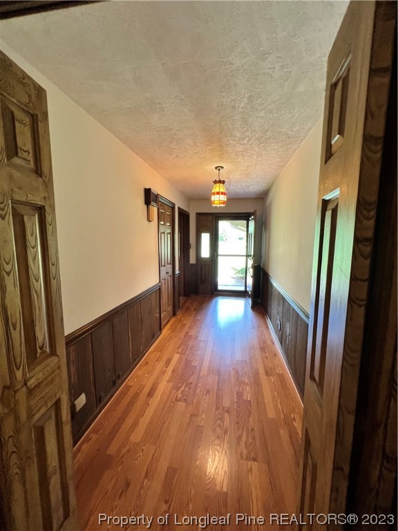1997 Jenkins Road Fairmont, NC 28340 - Photo 12 of 47 a view of hallway with wooden floor