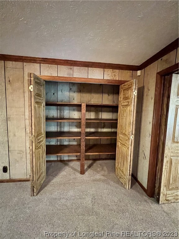 1997 Jenkins Road Fairmont, NC 28340 - Photo 14 of 47 a view of walk in closet with empty racks
