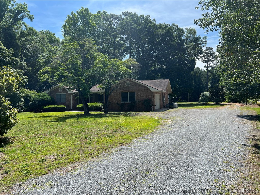 1997 Jenkins Road Fairmont, NC 28340 - Photo 4 of 47 a house view with a outdoor space