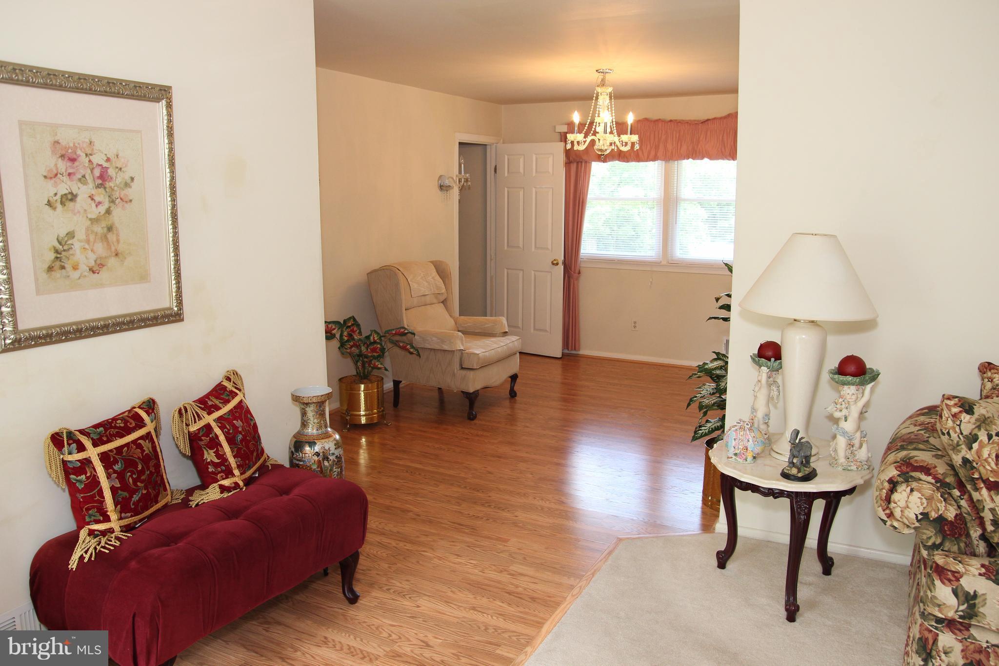 3413 Dunnington Road Beltsville, MD 20705 - Photo 2 of 16 a living room with furniture and a large window