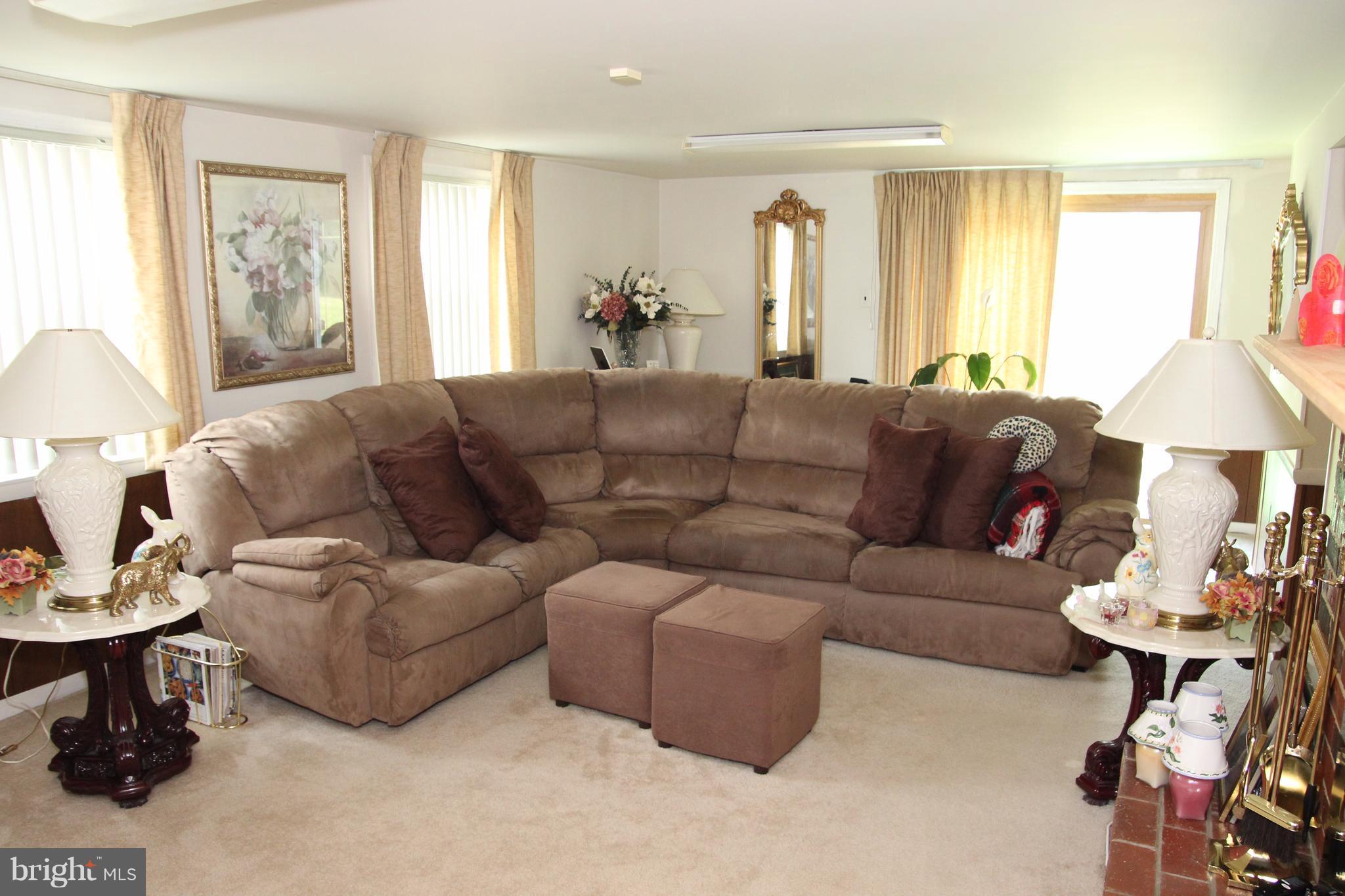 3413 Dunnington Road Beltsville, MD 20705 - Photo 14 of 16 a living room with furniture and a window