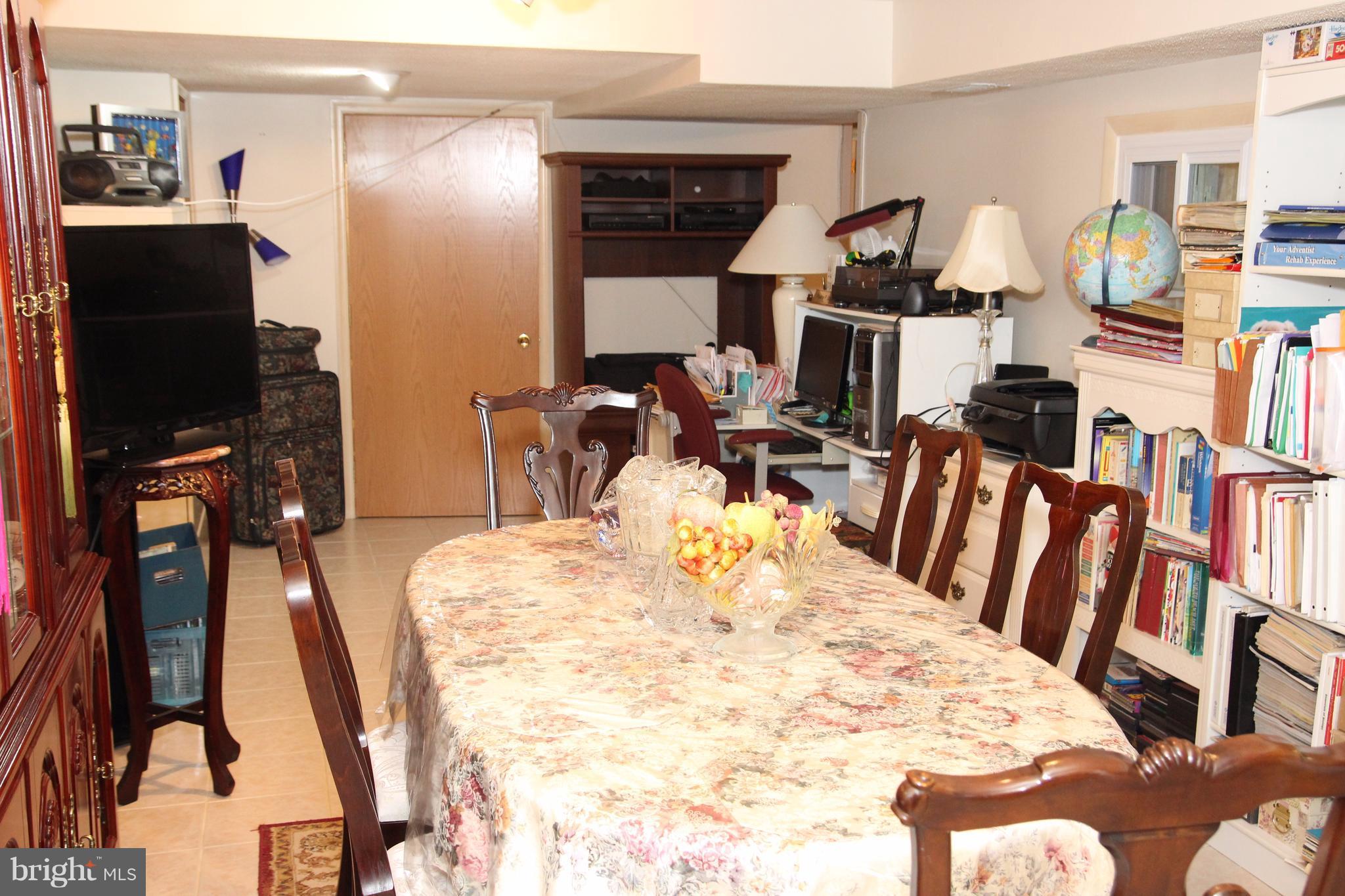 3413 Dunnington Road Beltsville, MD 20705 - Photo 16 of 16 a view of a dining room with furniture