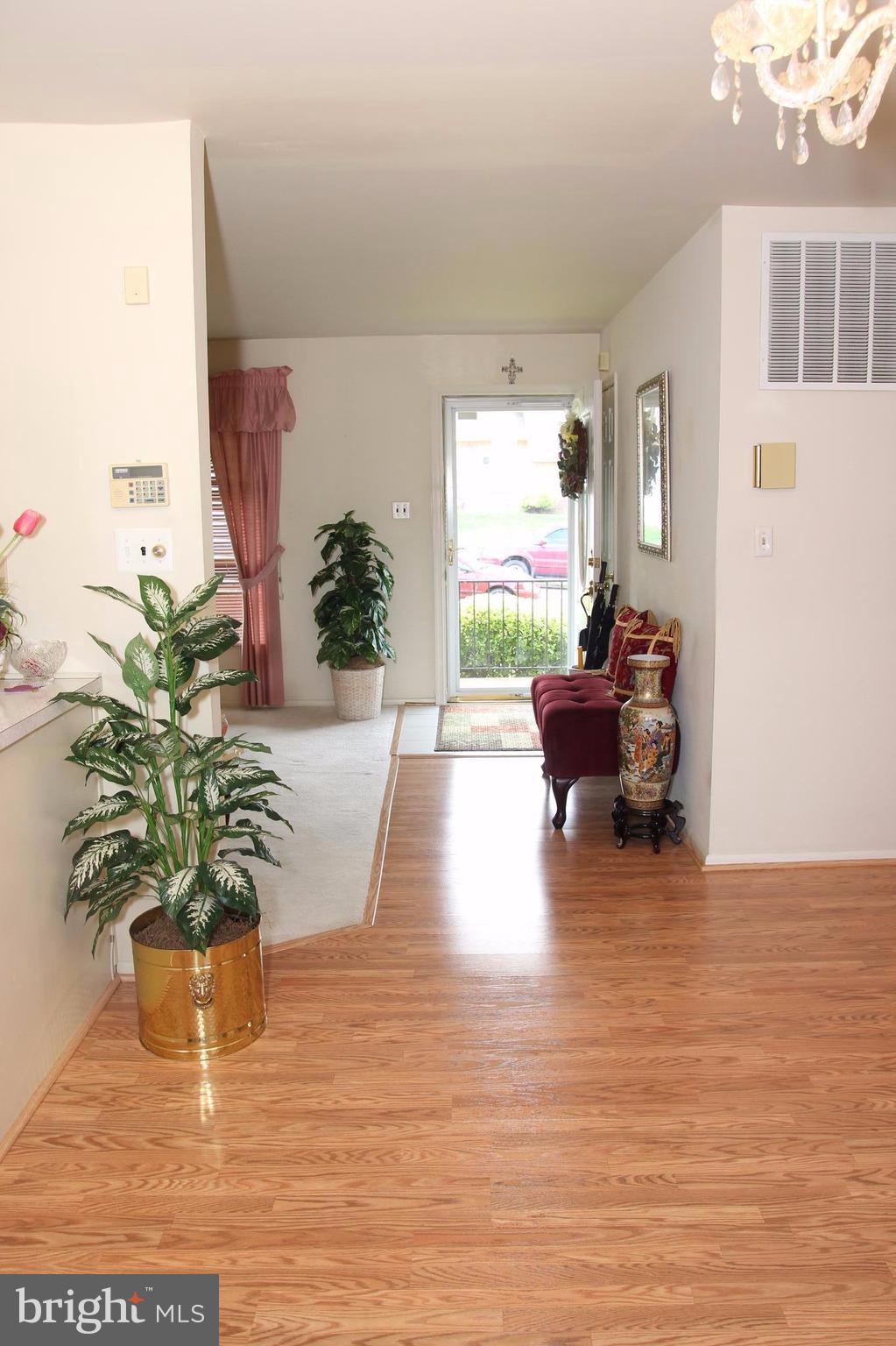 3413 Dunnington Road Beltsville, MD 20705 - Photo 10 of 16 a view of a living room and a potted plant