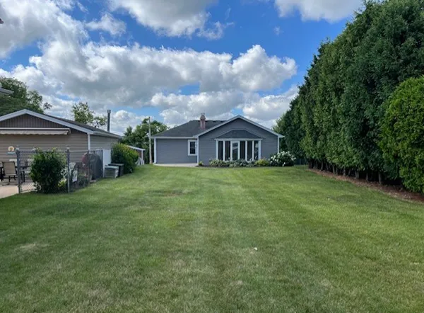 a view of house with outdoor space and entertaining space