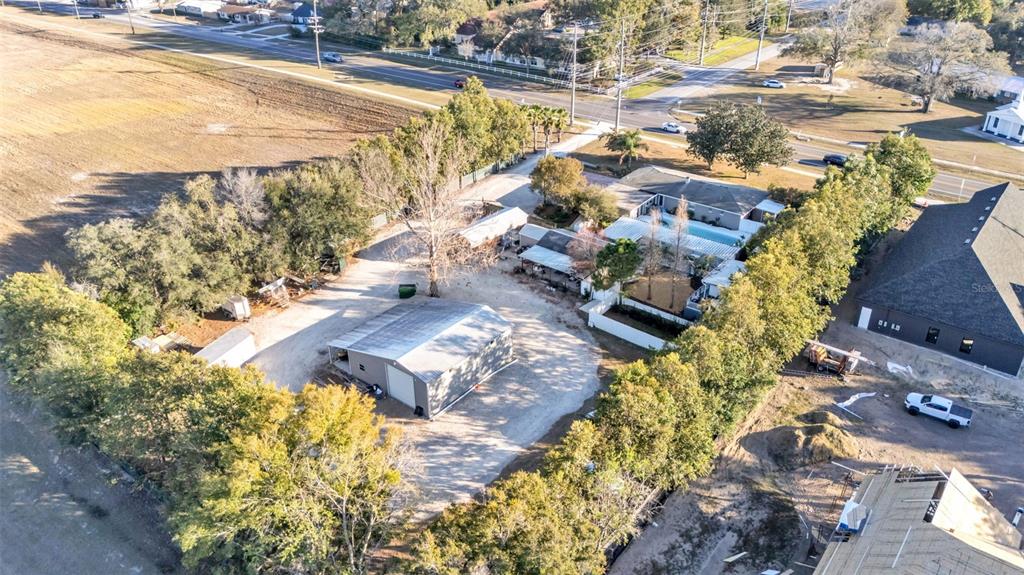 3830 Clubhouse Road Lakeland, FL 33812 - Photo 22 of 42 a view of a yard with swimming pool