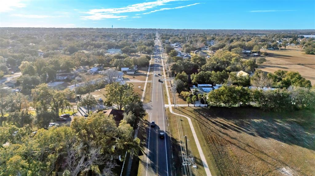 3830 Clubhouse Road Lakeland, FL 33812 - Photo 26 of 42 an aerial view of residential houses with outdoor space and river
