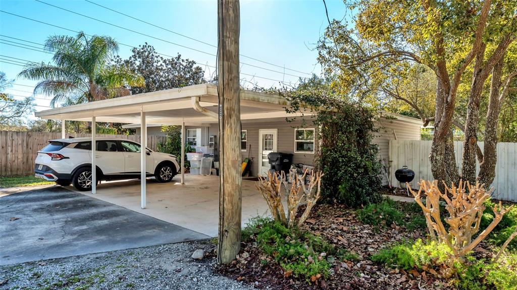 3830 Clubhouse Road Lakeland, FL 33812 - Photo 36 of 42 a view of a car park in front of house