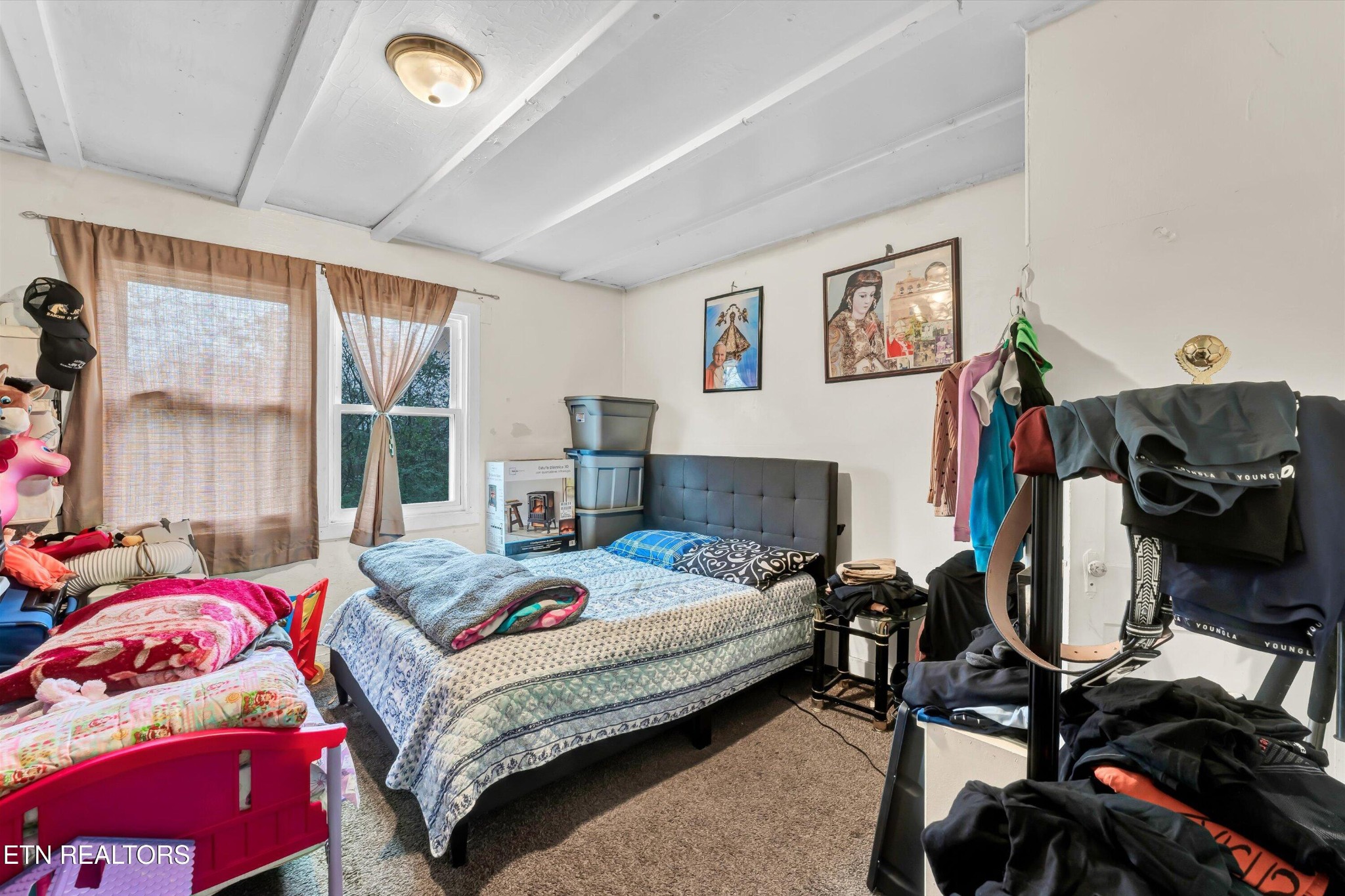 100102 Howard Lane Oak Ridge, TN 37830 - Photo 19 of 25 a bedroom with a bed and wooden floor