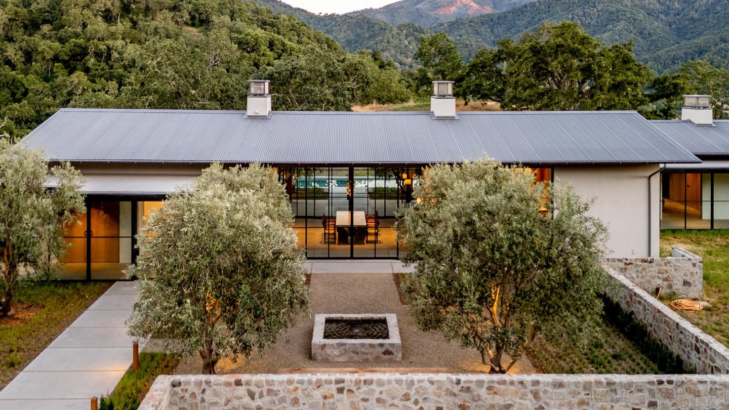 16 Touche Pass Carmel, CA 93923 - Photo 5 of 42 front view of a house with a yard
