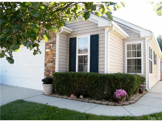4925 Mocha Lane Raleigh, NC 27616 - Photo 1 of 25 a front view of a house with garden