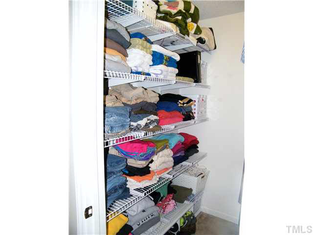 4925 Mocha Lane Raleigh, NC 27616 - Photo 14 of 25 a room with storage and utility
