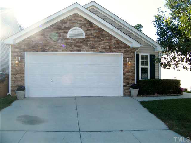 4925 Mocha Lane Raleigh, NC 27616 - Photo 2 of 25 a front view of a house with a yard
