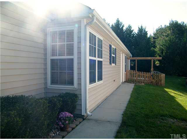 4925 Mocha Lane Raleigh, NC 27616 - Photo 3 of 25 a view of a house with backyard and garden