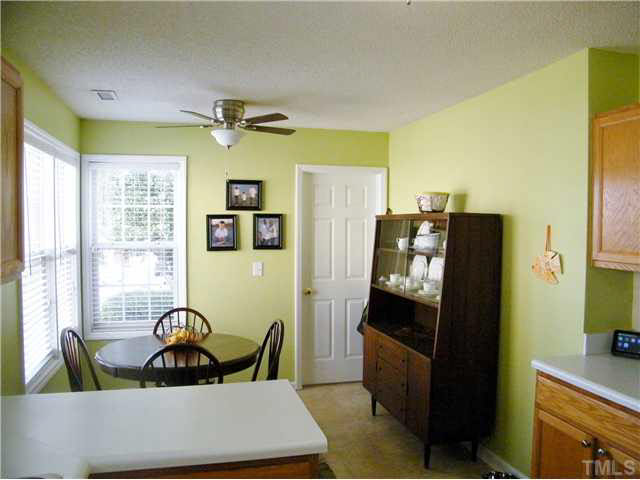 4925 Mocha Lane Raleigh, NC 27616 - Photo 7 of 25 a living room with furniture and a window
