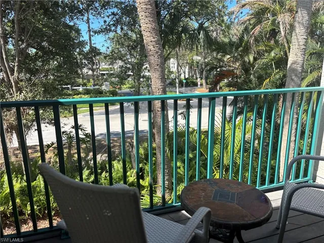 a view of a two chairs in the deck